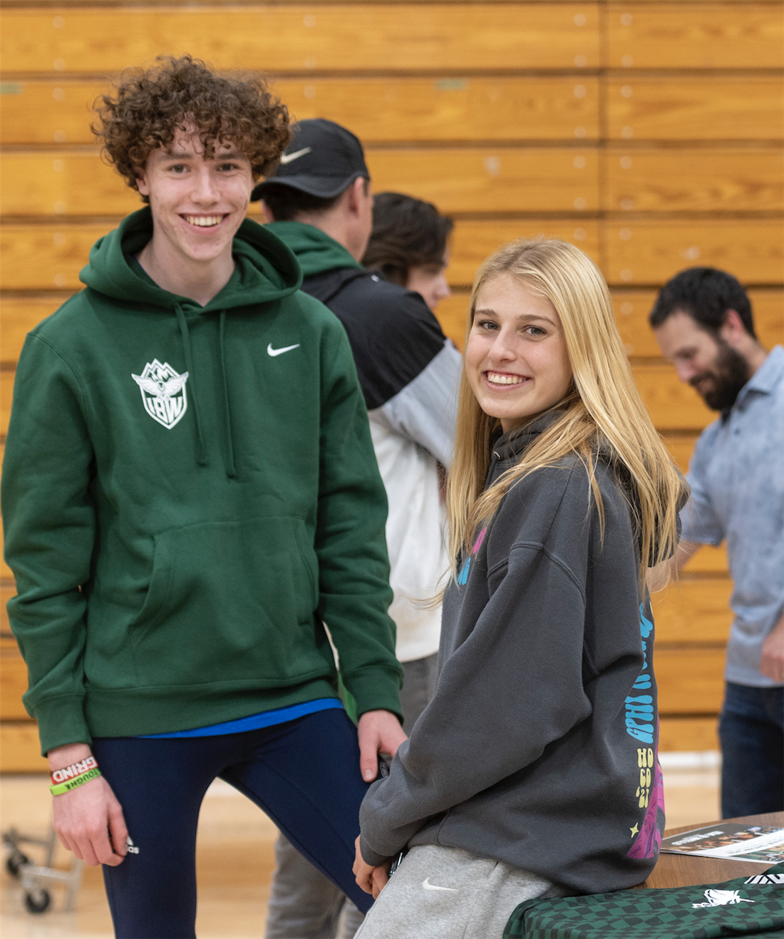 Students posing in gym